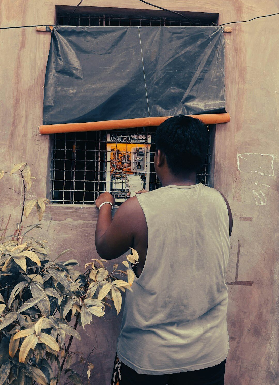 Photographer editing documentary photos of local communities on a laptop